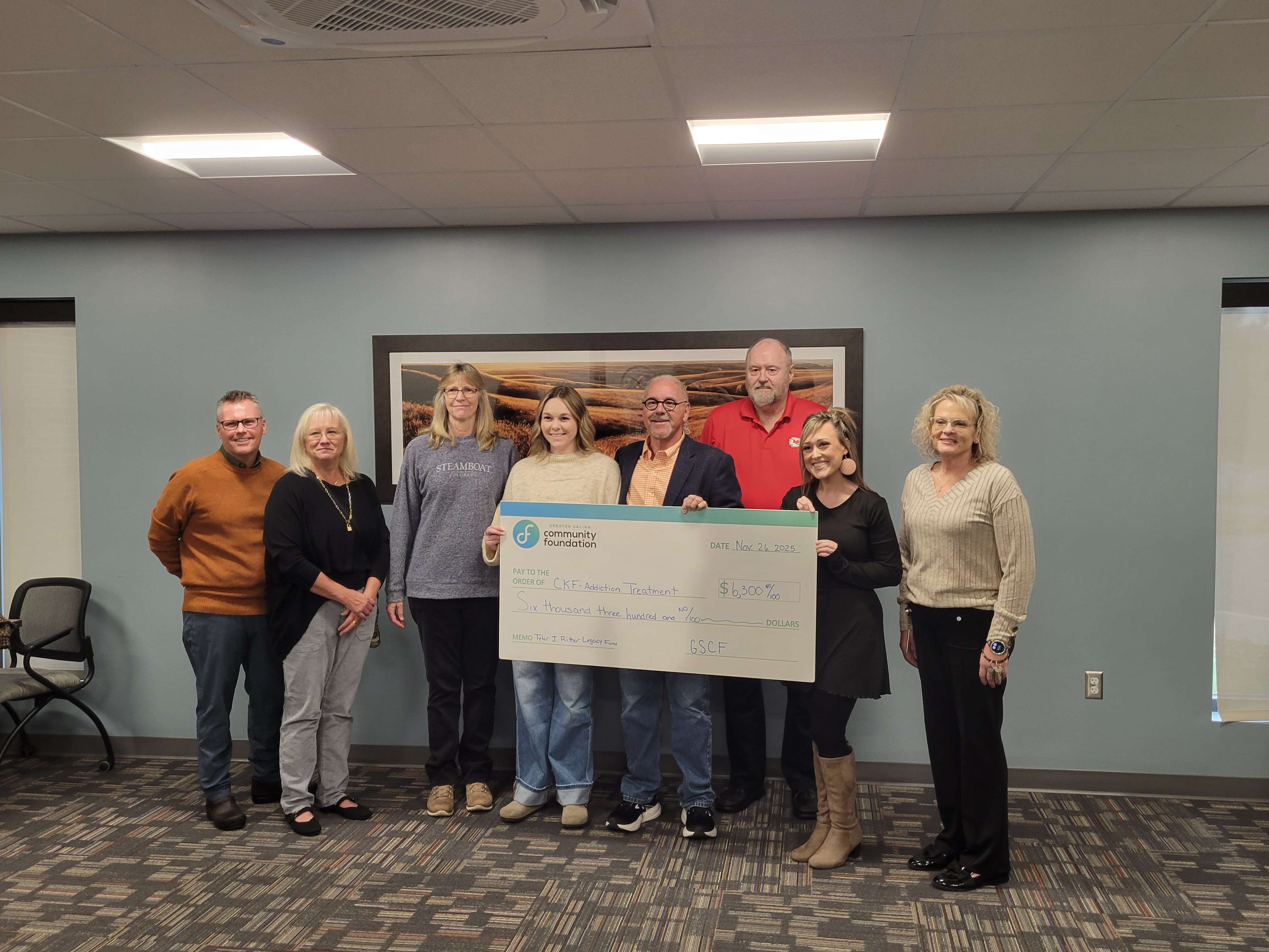 Ritter Family and Greater Salina Community Foundation presenting a check to the CKF Addiction Treatment facility. Photo by Jacob Brown