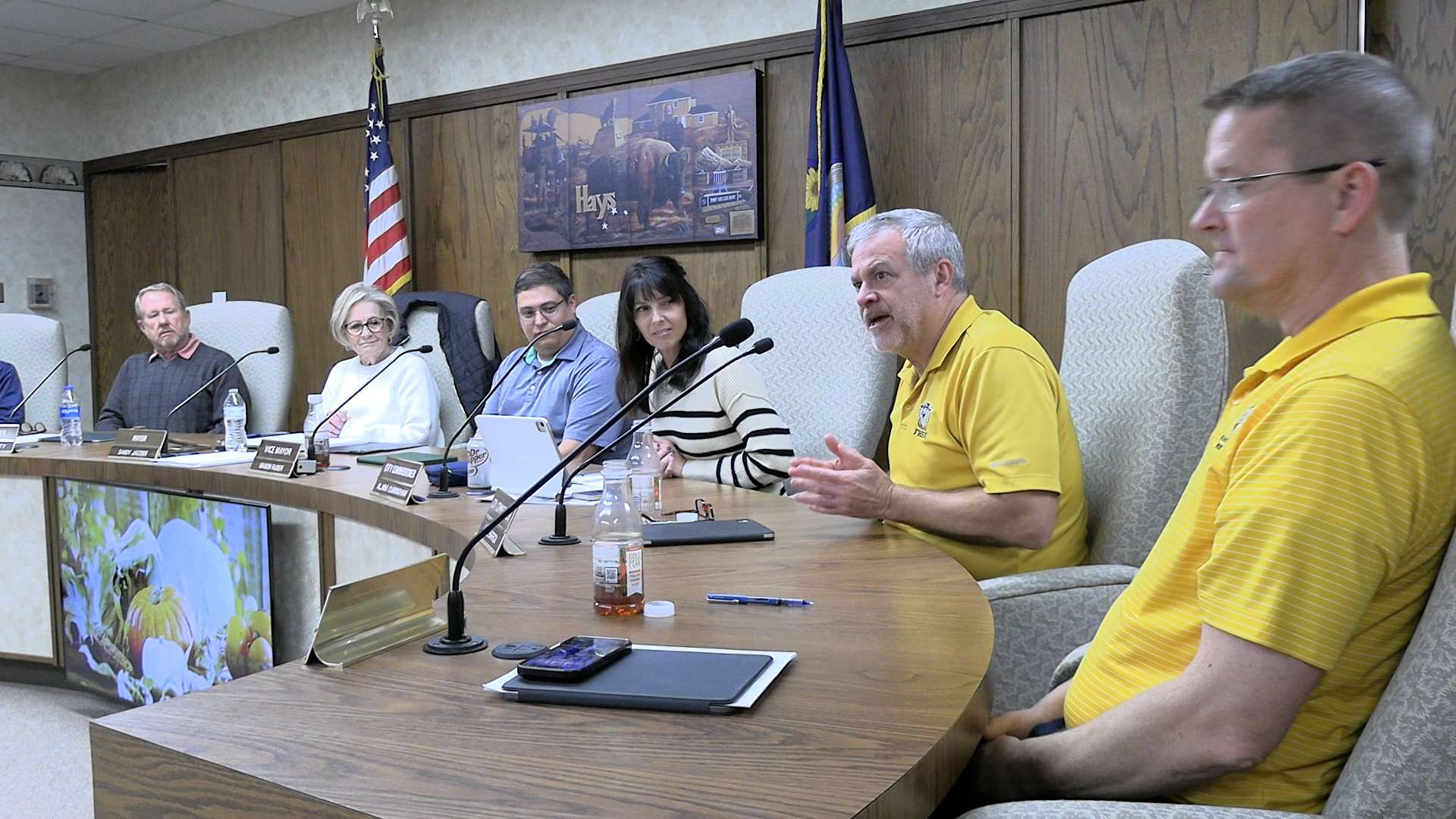Hays city commissioners with Toby Dougherty, city manager (at left) during the Nov. 25 commission meeting. Photo by Becky Kiser