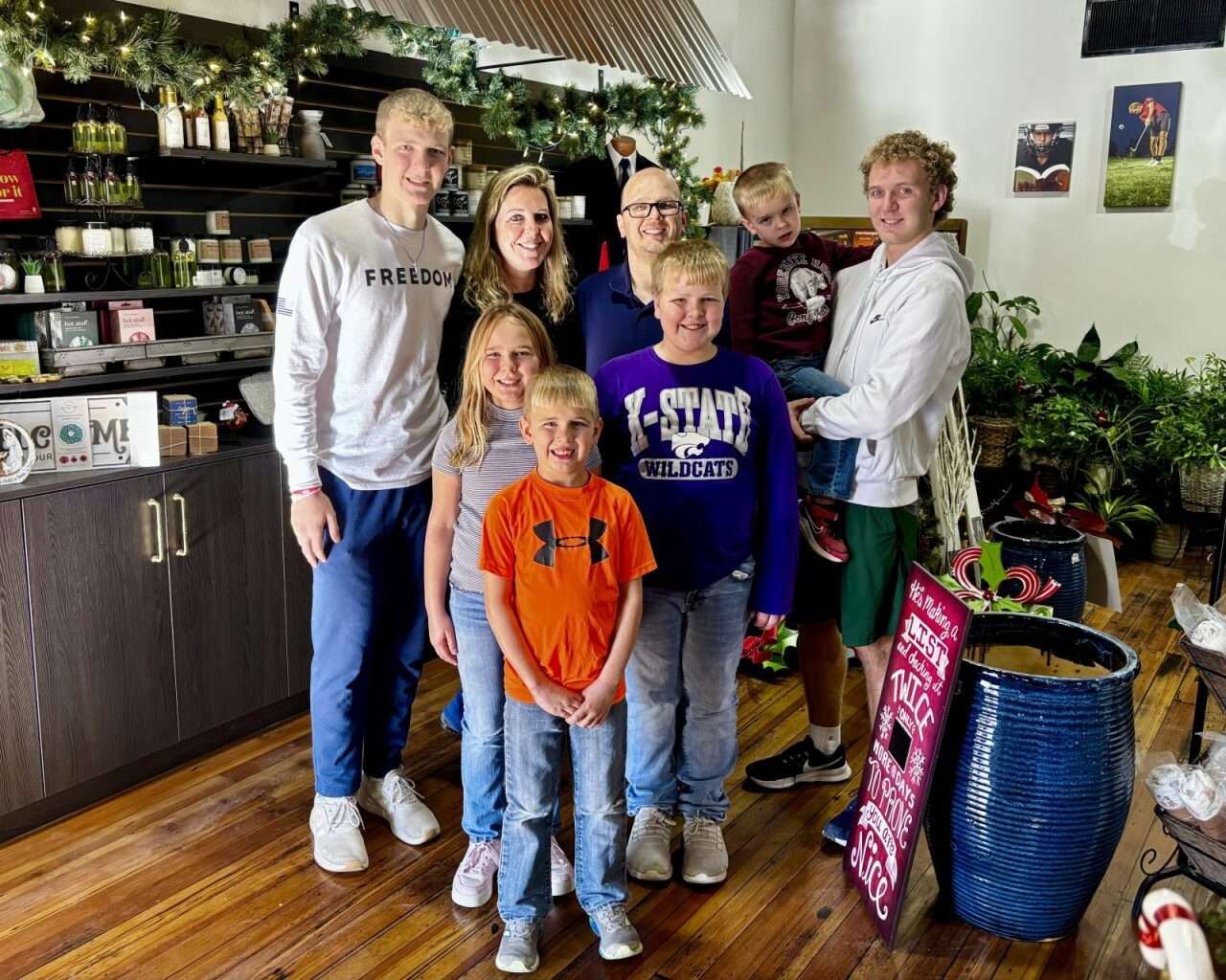 The Brewster family at their Paradise Flats Gifts &amp; Florals shop in Plainville. Photo by Tony Guerrero/Hays Post