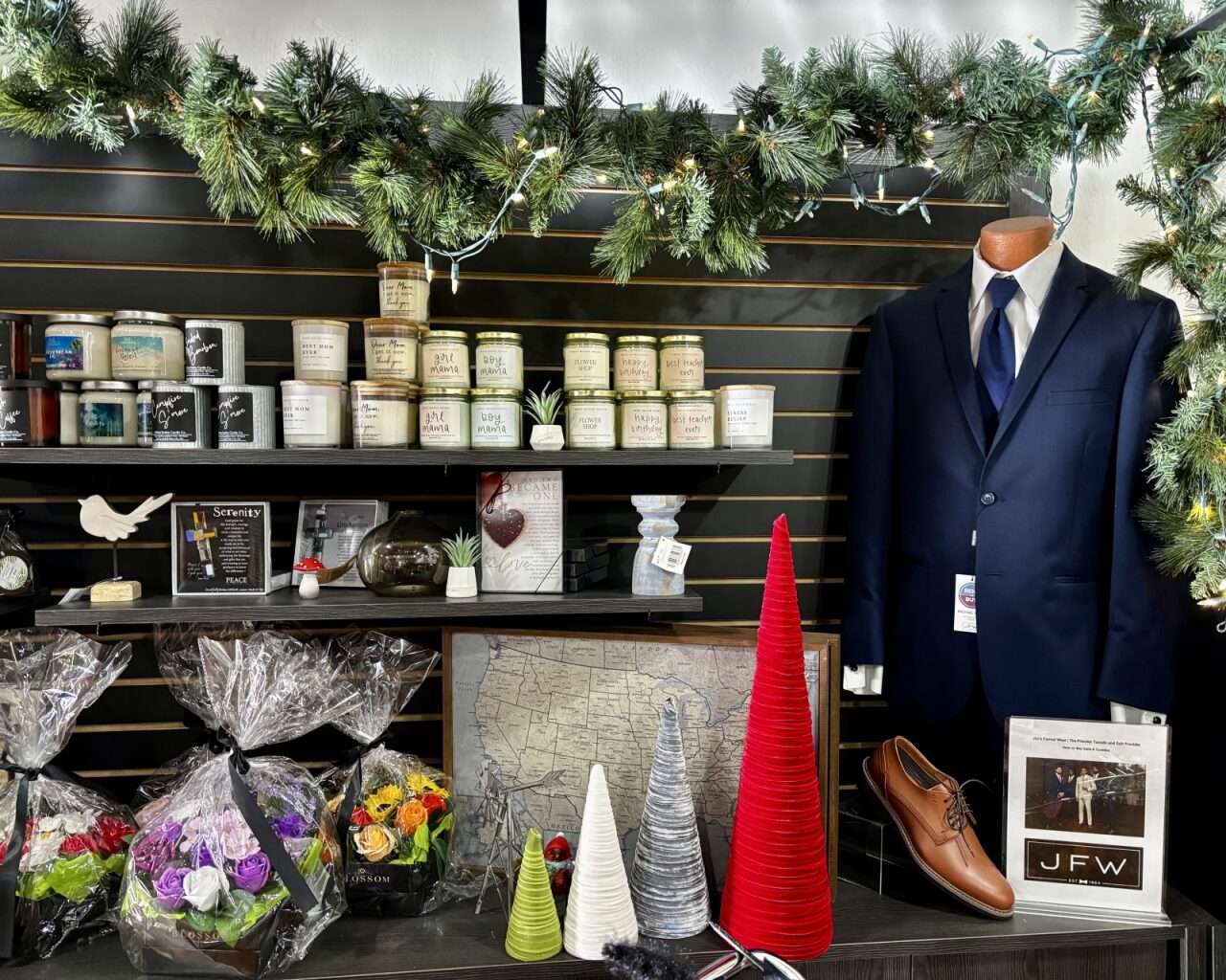 Candles, decorations and a tuxedo on display at Paradise Flats Gifts &amp; Florals in Plainville. Photo by Tony Guerrero/Hays Post