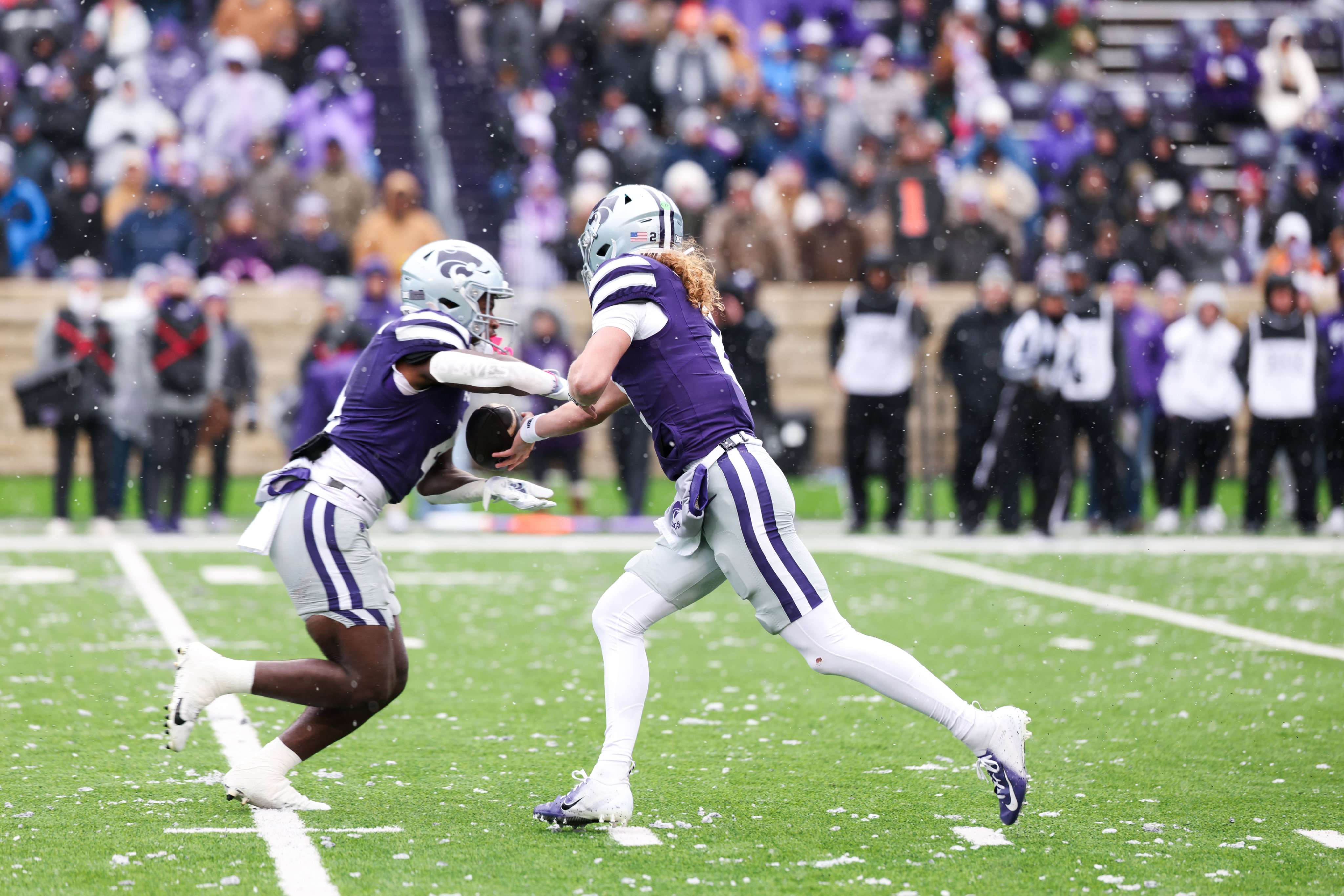 Avery Johnson hands the ball off to Joe Jackson before he rushes for a touchdown.&nbsp; Jackson had another big day on the ground, running for 142 yards and three touchdowns/ Photo courtesy of K State Football on X