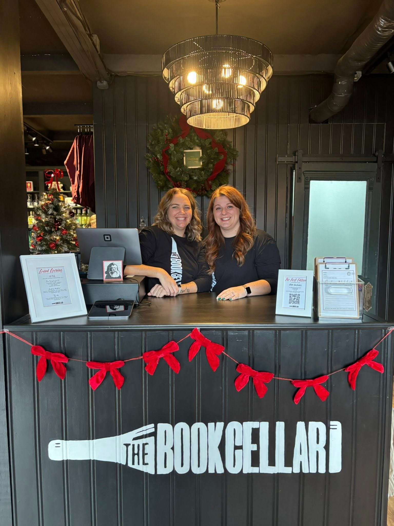 Kelsey Hall and Rebecca Kratzer recently celebrated the grand opening of The Book Cellar, a retail book and liquor store, in downtown Claflin.