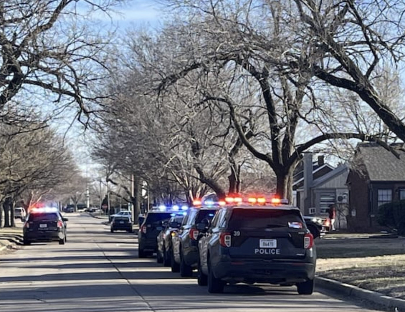 Police on the scene of the investigation -photo courtesy KWCH