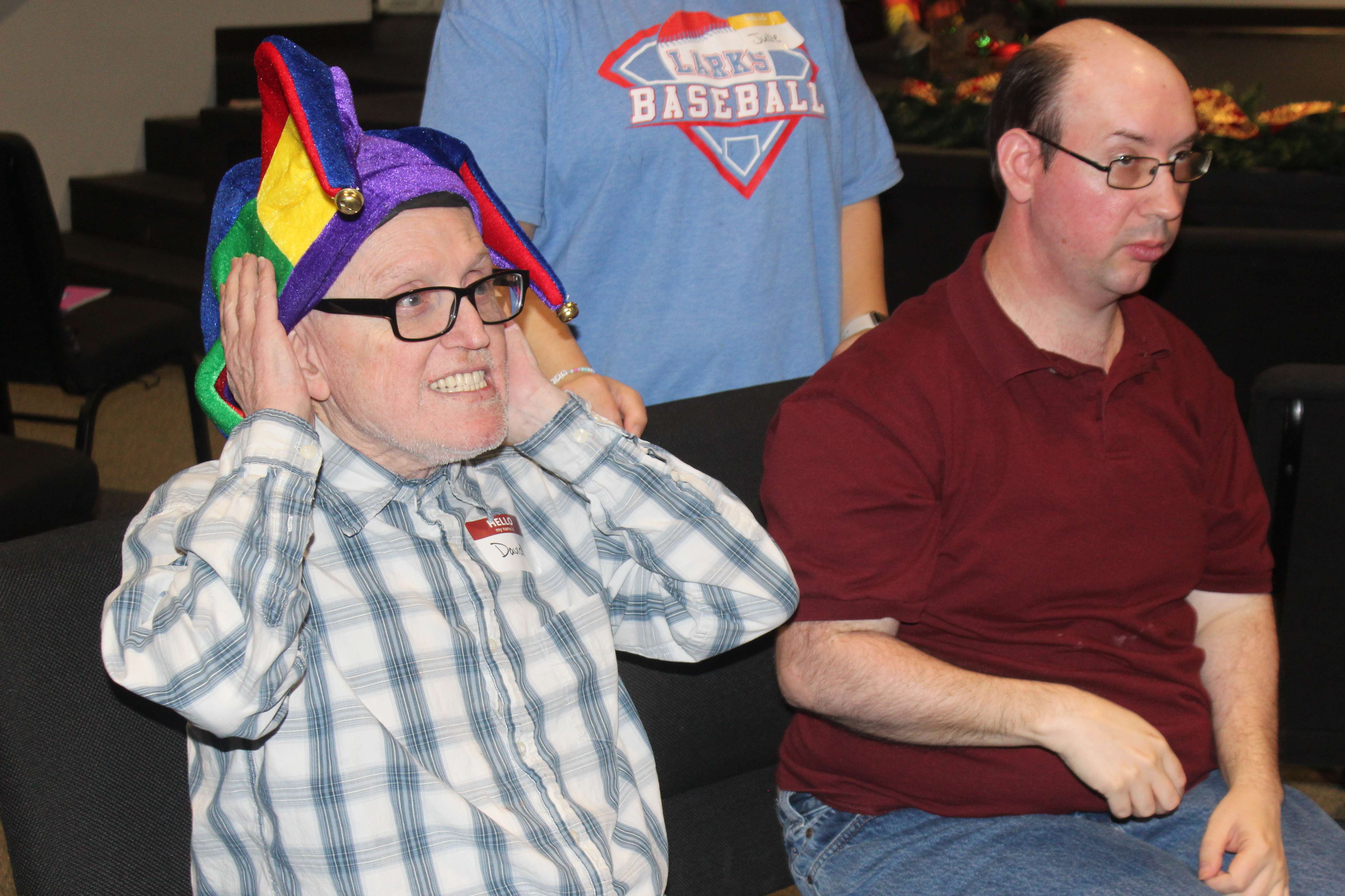 A camper shows off a big grin during the Center Stage Theater Camp this week in Hays. Campers who have developmental disabilities have the opportunity to play theater-inspired games and spend time with friends. Photo by Cristina Janney/Hays Post