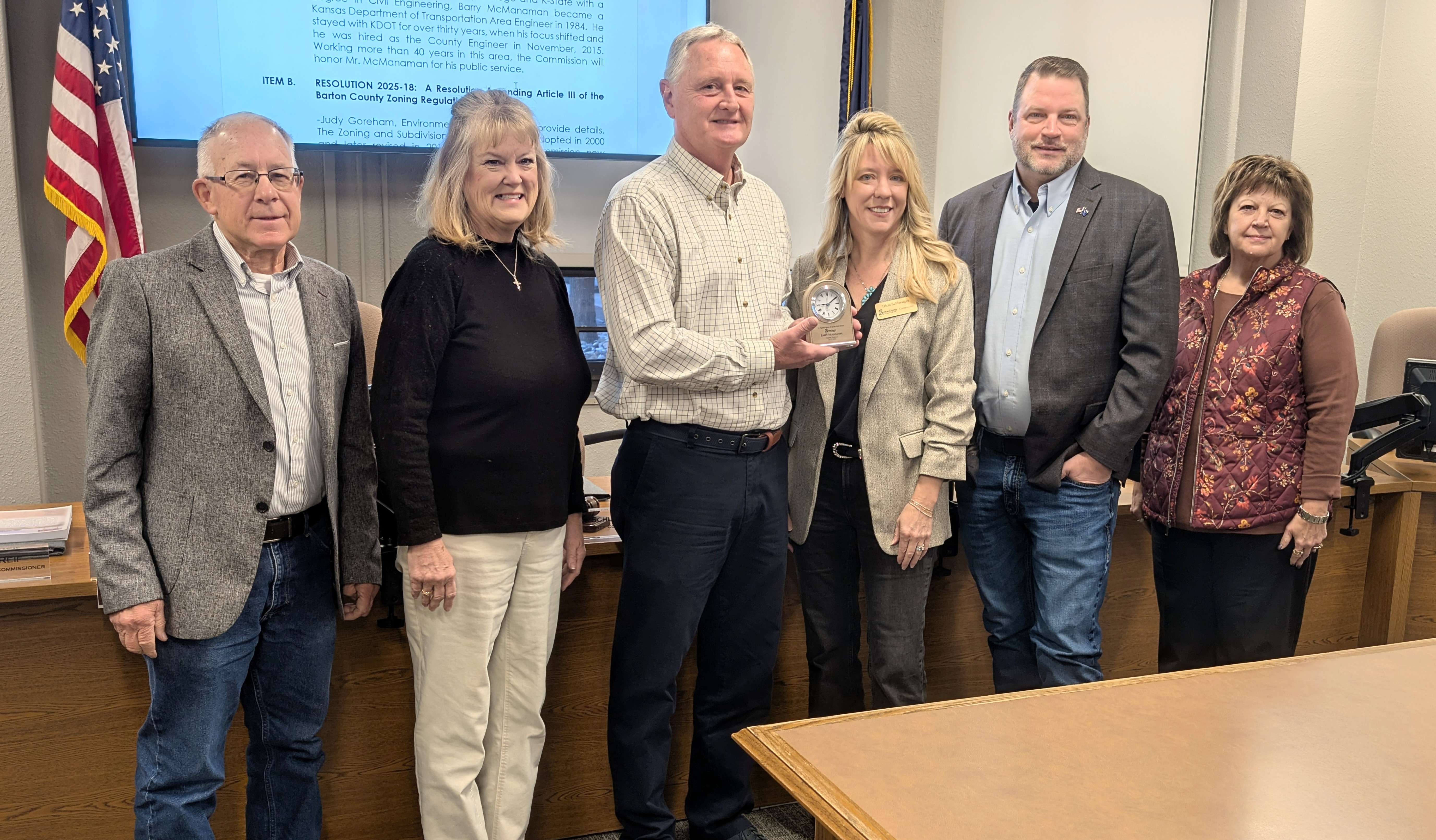 McManaman retires: Retiring Barton County Engineer Barry McManaman, third from the left, is recognized by the County Commission Tuesday morning. Pictured with him are commissioners Duane Reif, Barb Esfeld, Tricia Schlessiger, Shawn Hutchinson and Donna Zimmerman.