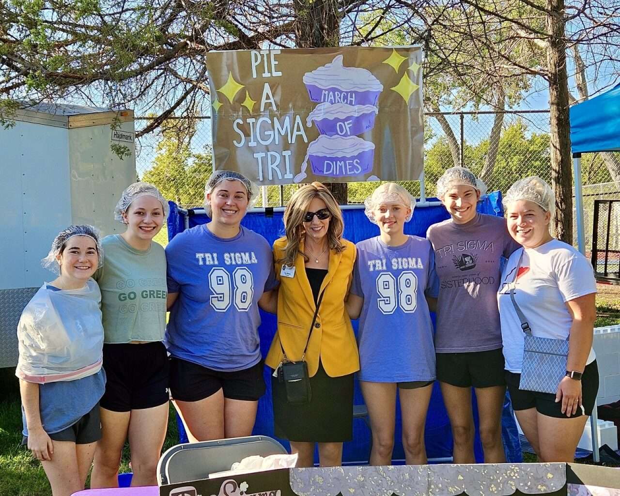 Fort Hays State University President Tisa Mason with Tri Sigma members at a pie event. Courtesy photo