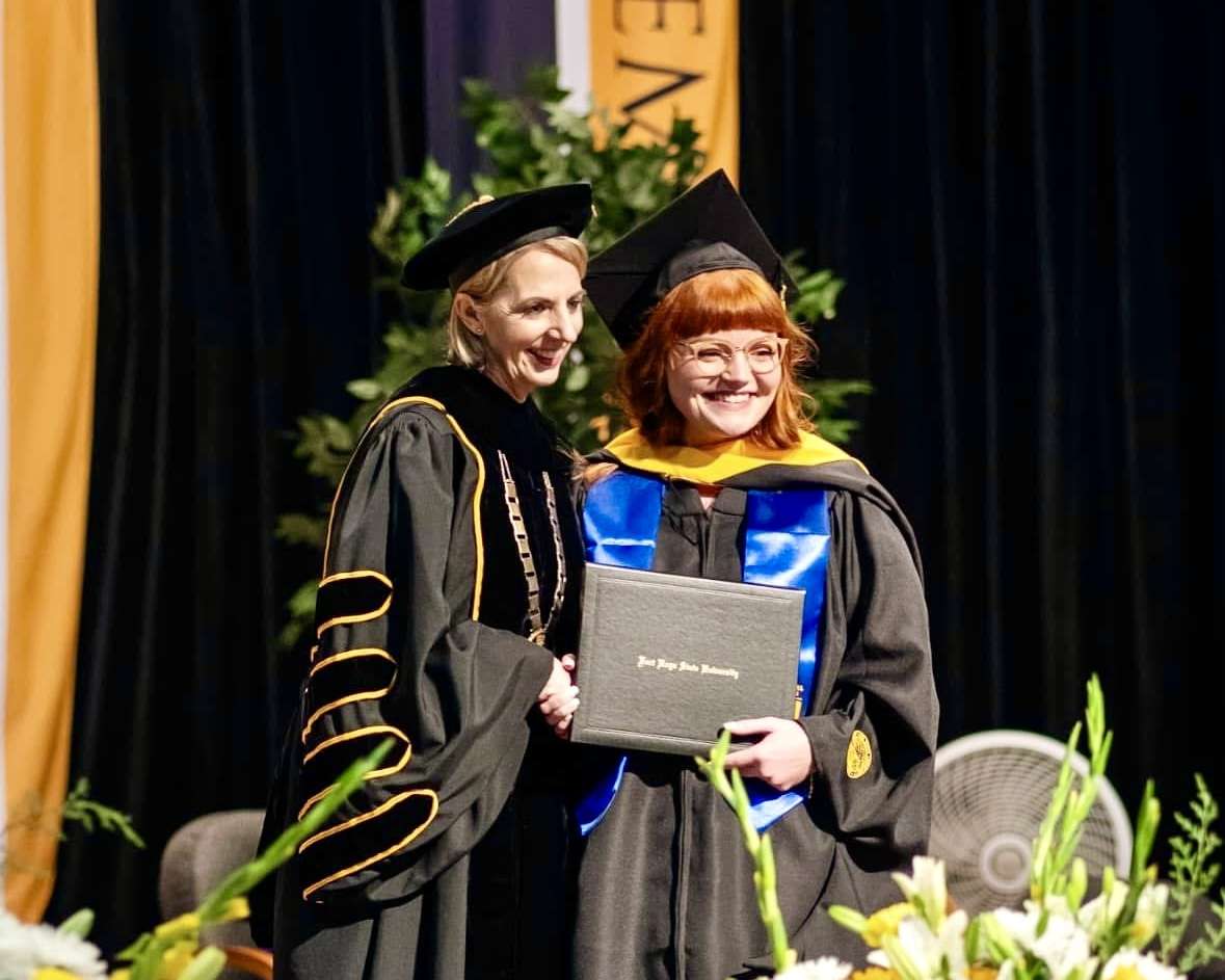 Fort Hays State University President Tisa Mason with a graduate at the commencement ceremony. Courtesy photo