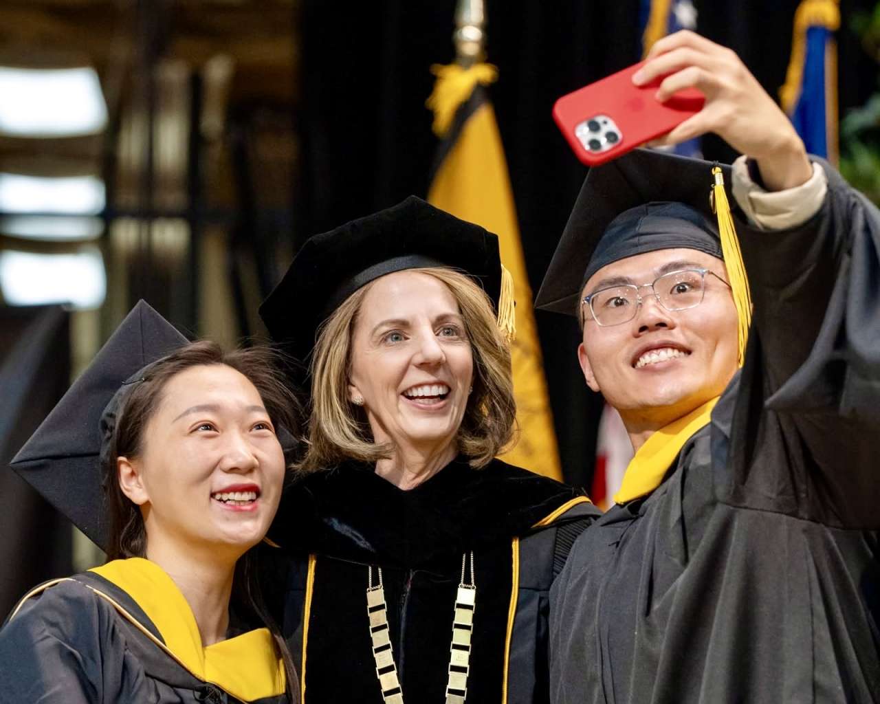 Fort Hays State University President Tisa Mason with a graduate at the commencement ceremony. Courtesy photo