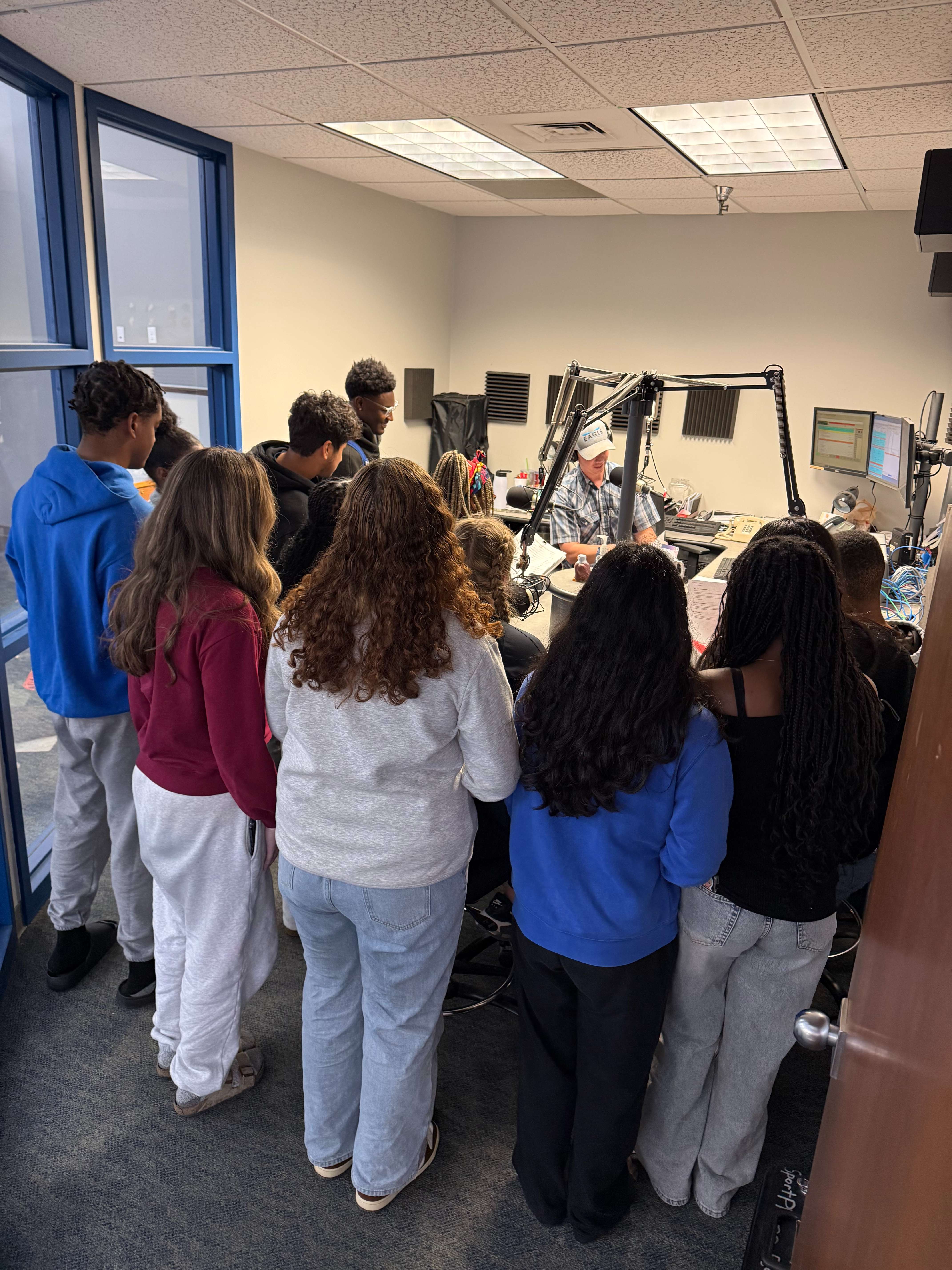 Junction City High School Marking Students recording ads in the 107.9 FM / 1420 AM KJCK Radio studio in Junction City. 