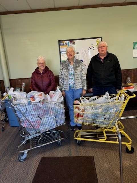 Hays First United Methodist Church volunteers collect grocery donations for the Community Assistance Center. Courtesy photo