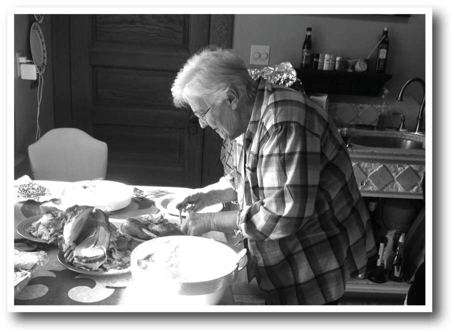 Andy's mom working over the Thanksgiving Day table. Courtesy photo