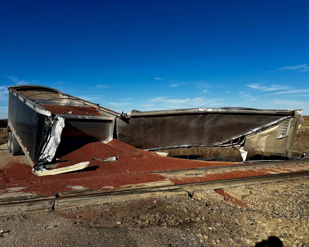 The aftermath of a train colliding with a semi-truck at Vincent Road and Old Highway 40 east of Victoria. Photo by Tony Guerrero/Hays Post