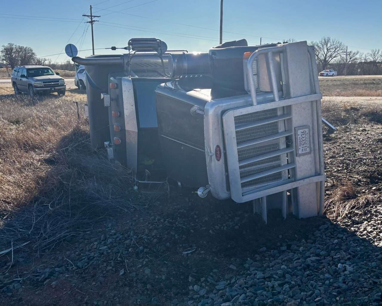 A flipped semi-truck after a train collision at Vincent Road and Old Highway 40 east of Victoria. Photo by Tony Guerrero/Hays Post
