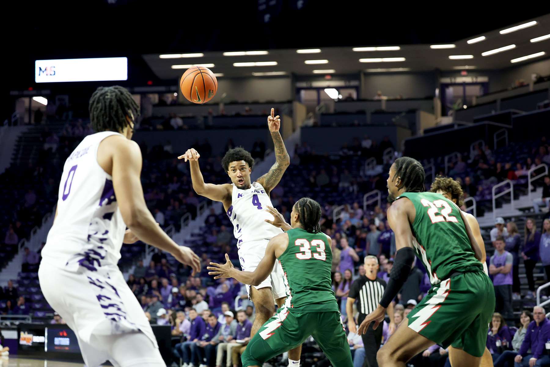 Kansas State guard P.J. Haggerty (4)&nbsp; passes to Elias Rapieque (0) during the first half of their game against Mississippi Valley State on Monday, December 8, 2025 in Manhattan, Kan. (Kansas State Athletics photo)