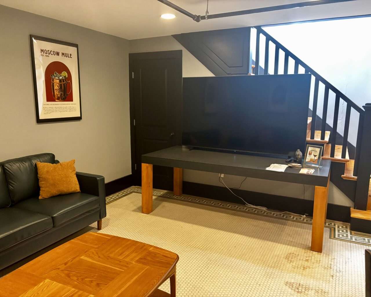 A TV in the lounge area in the basement of Mixto Cocktail Bar.&nbsp;Photo by Tony Guerrero/Hays Post