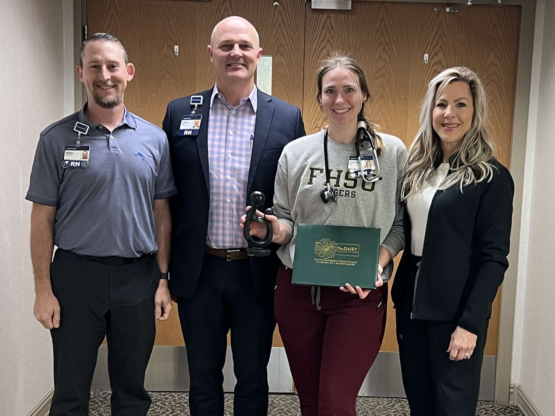 Brian Pfannenstiel, director of critical care, Joben Rieth, vice-president of patient care services and Chief Nursing Officer Kaylyn Bustillos, RN, and Janine Kisner, ICU/PCU supervisor. Photo by HaysMed