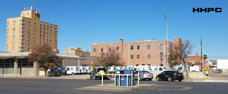 High Hat Chili Systems - Post Office Delivery Vehicles Parking Lot - 108 E. 1st - Nov. 9, 2025. Courtesy of the Conard-Harmon Collection.