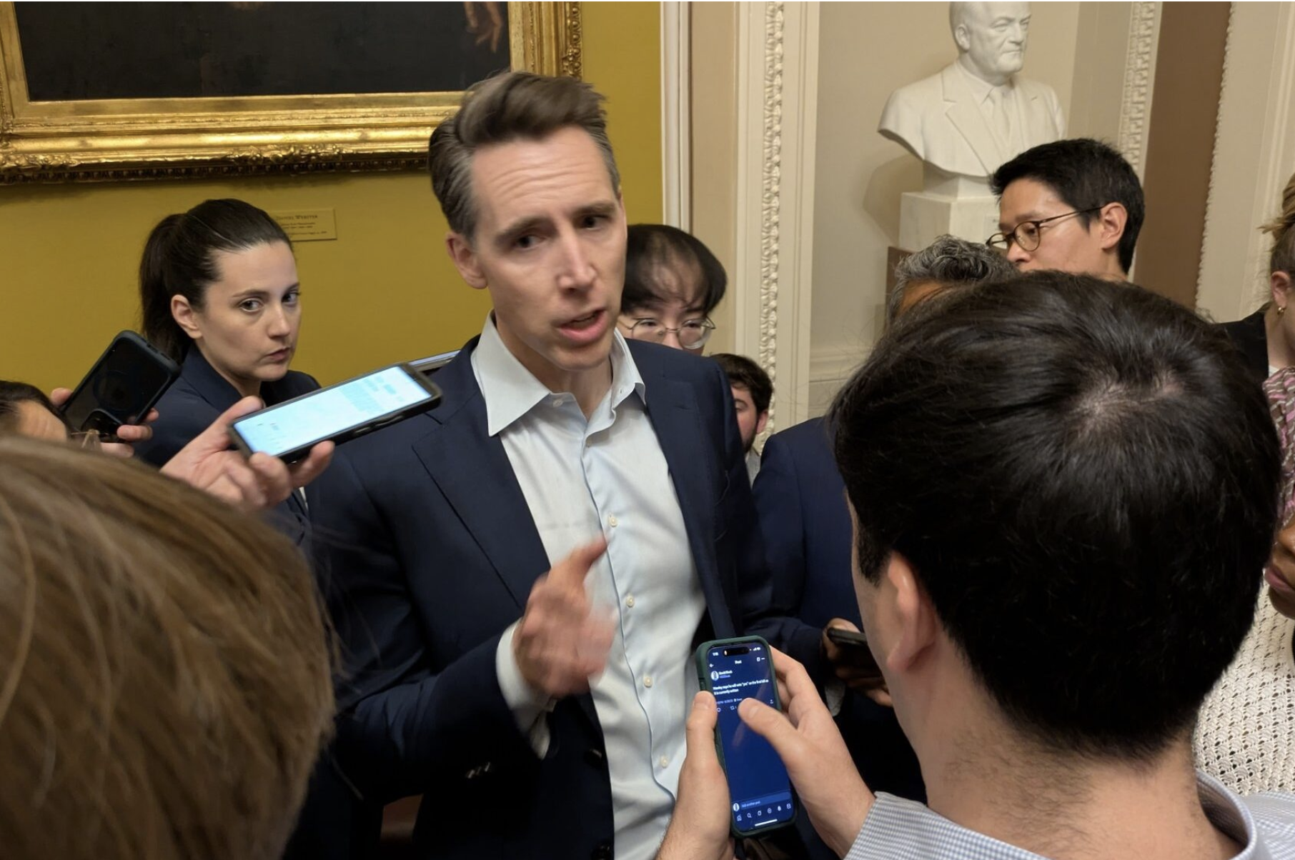 U.S. Sen. Josh Hawley talks to reporters at the U.S. Capitol on June 28 (Ashley Murray/States Newsroom).