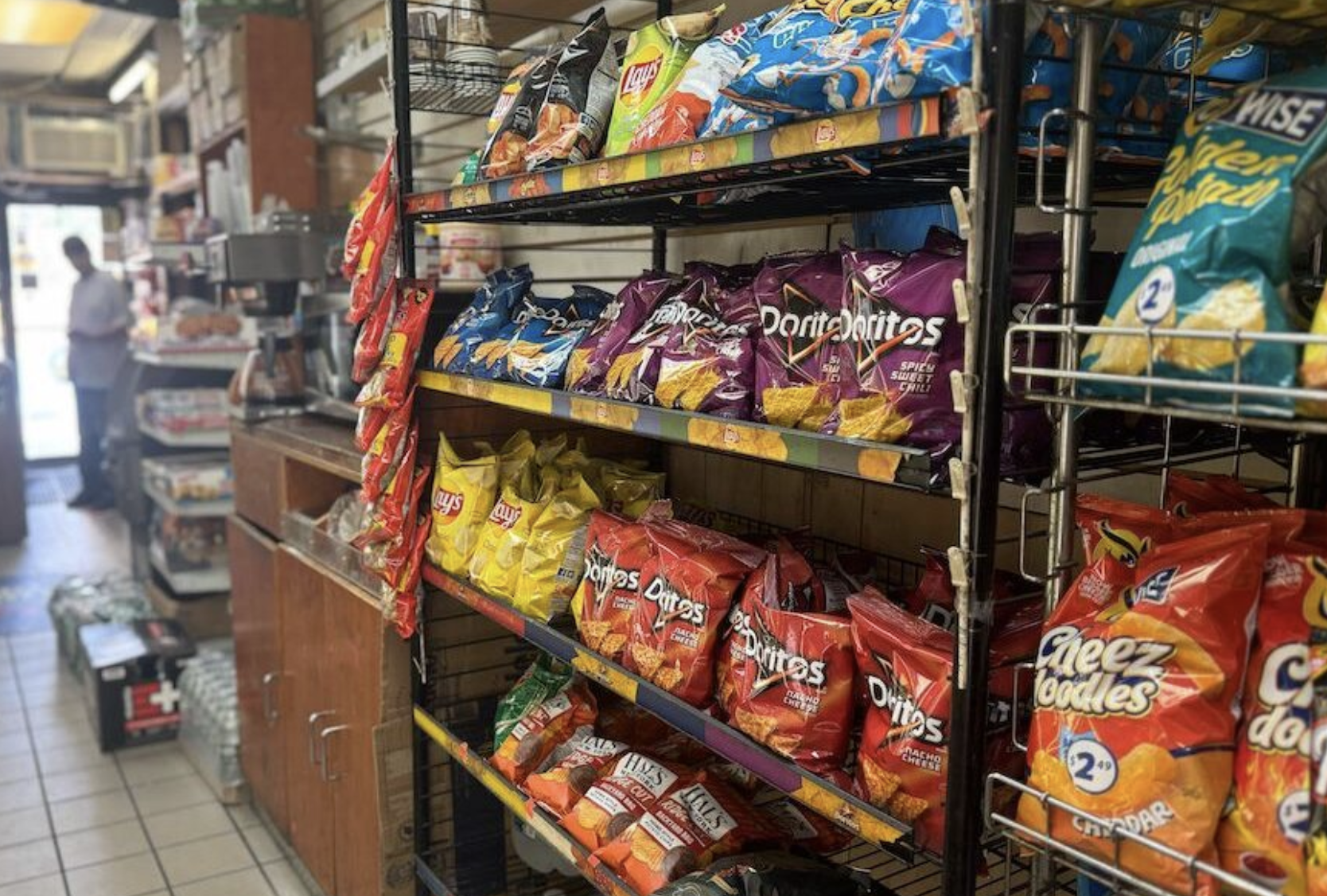 Sodas and chips are displayed at a convenience store in the Astoria neighborhood of Queens in New York. As of this month, 12 states, mostly Republican and in the South, have opted to limit SNAP recipients from purchasing foods such as soda and candy (Shalina Chatlani/ Stateline).