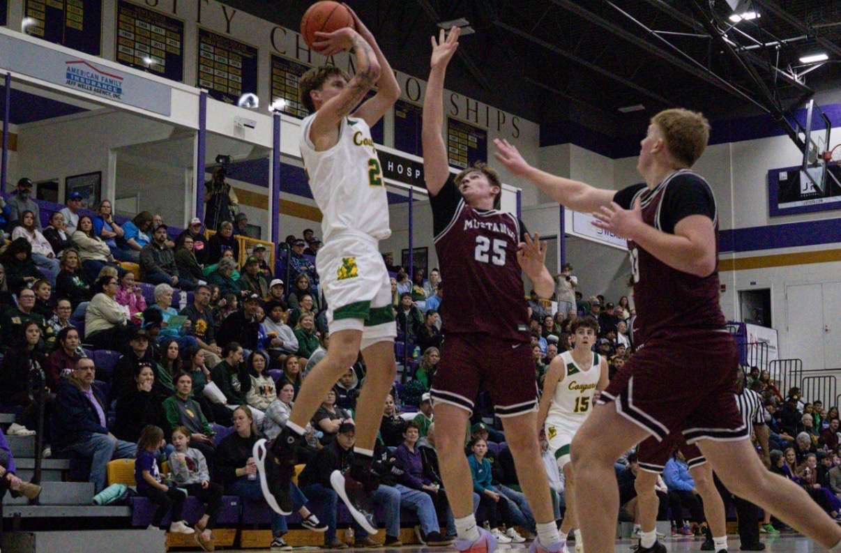 Sawyer Walker pulls up for a big shot against the Mustangs. Photo by Kaiden Comeau.