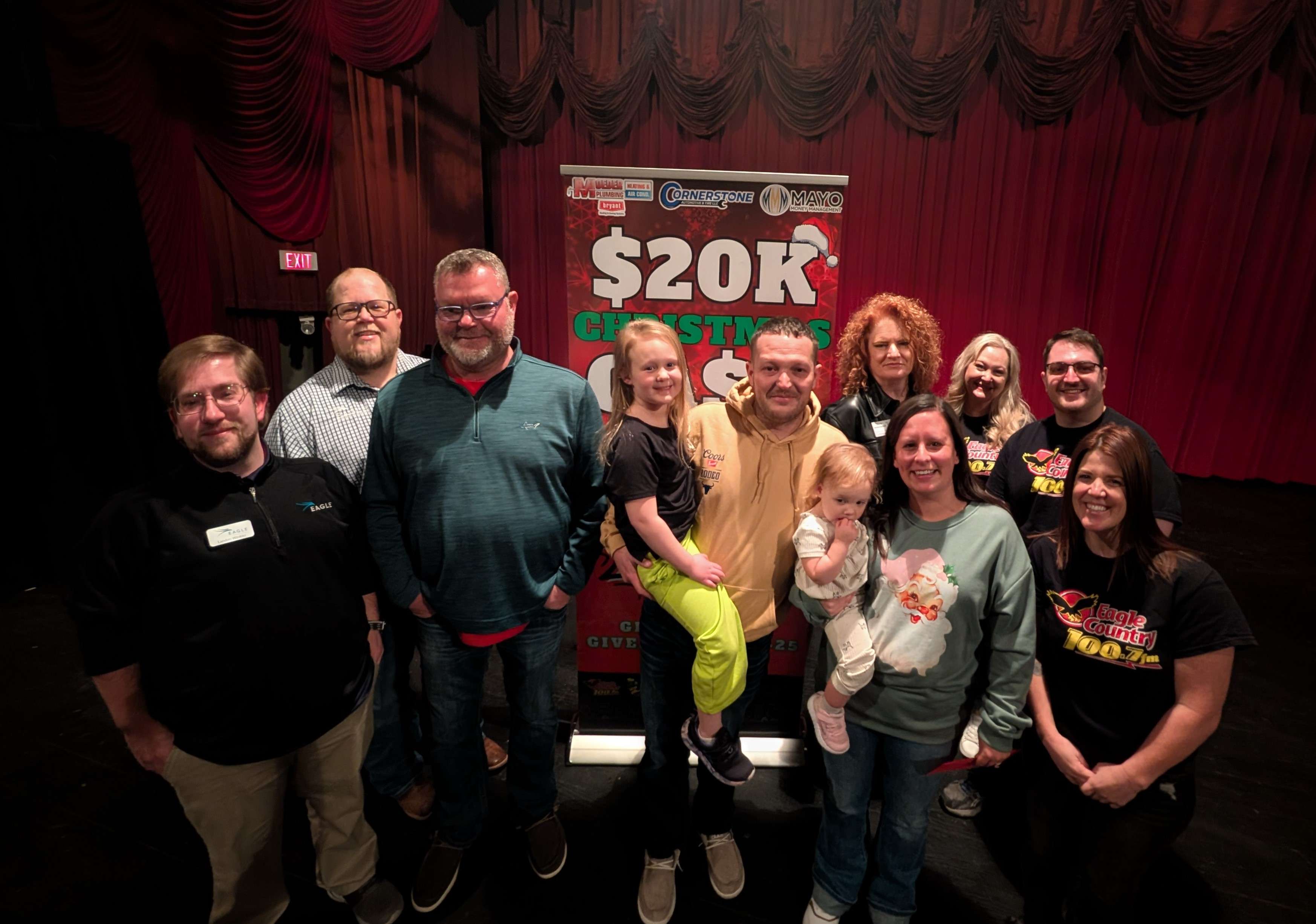 A recent photo of the Eagle Media Team with our $20K Winner the &nbsp;Burkholder family.