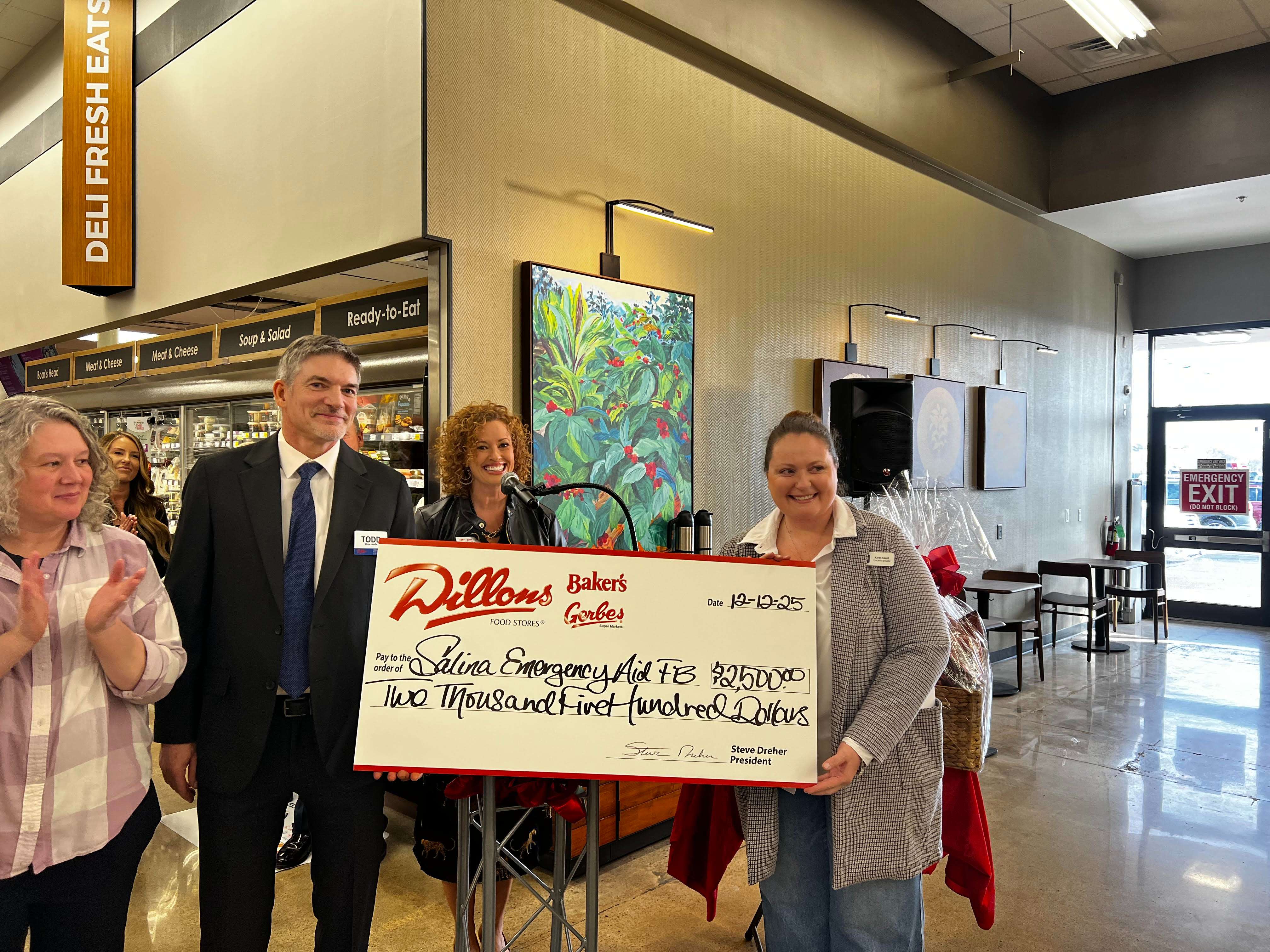 Dillons presents $2,500 check Director of Salina Emergency Aid Food Bank, Karen Couch. Photo by Nicolas Fierro
