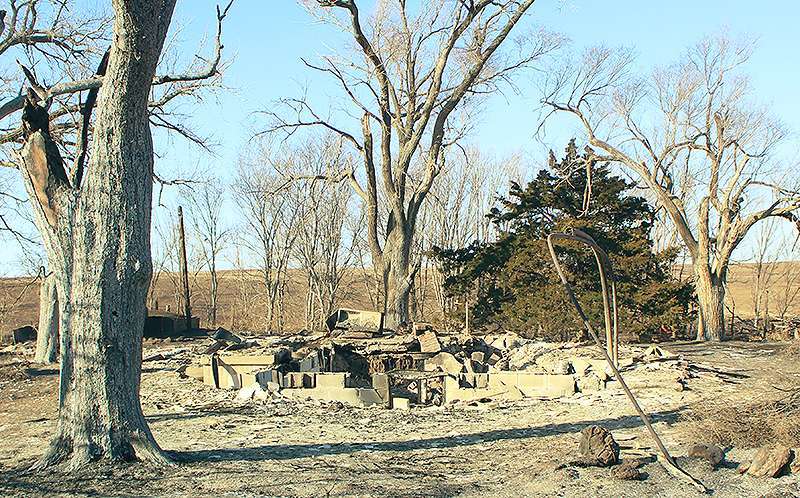 A farmstead burned along Kansas Highway 18 outside of Paradise. It was unknown if anyone was living at this location at the time of the fire. Photo by Cristina Janney/Hays Post