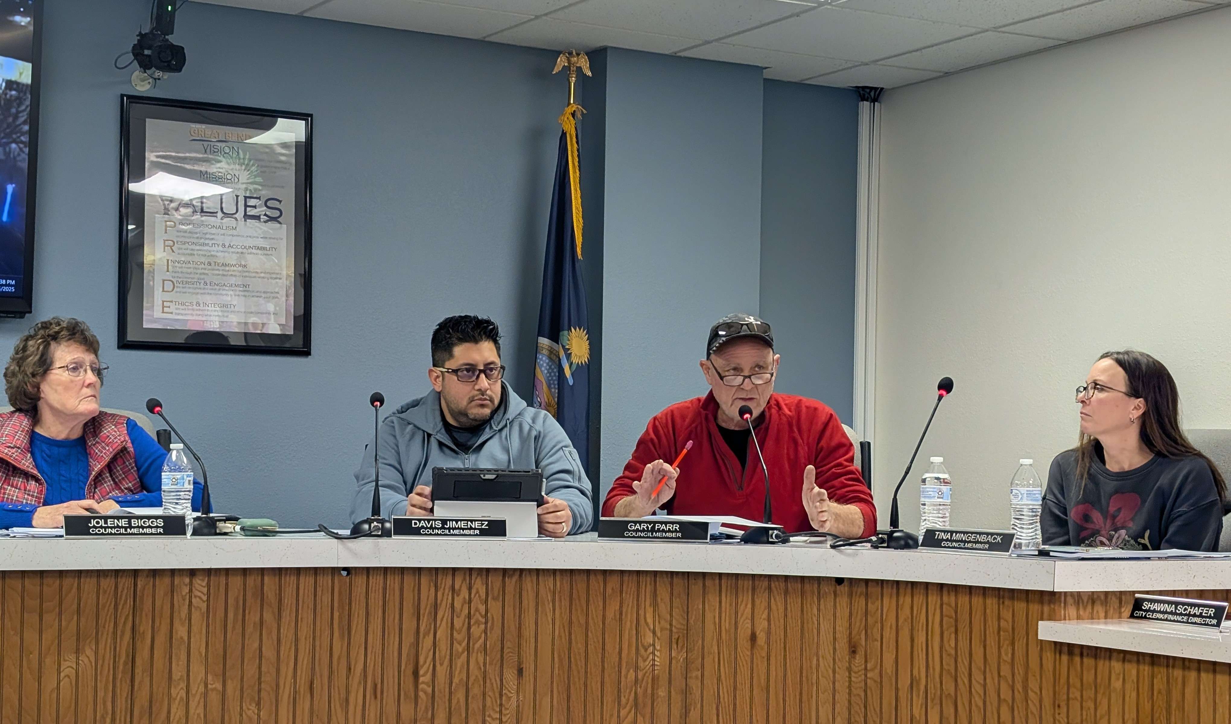 Great Bend City Councilman Gary Parr (in red) demanded answers from Great Bend Economic Development during Monday's meeting.