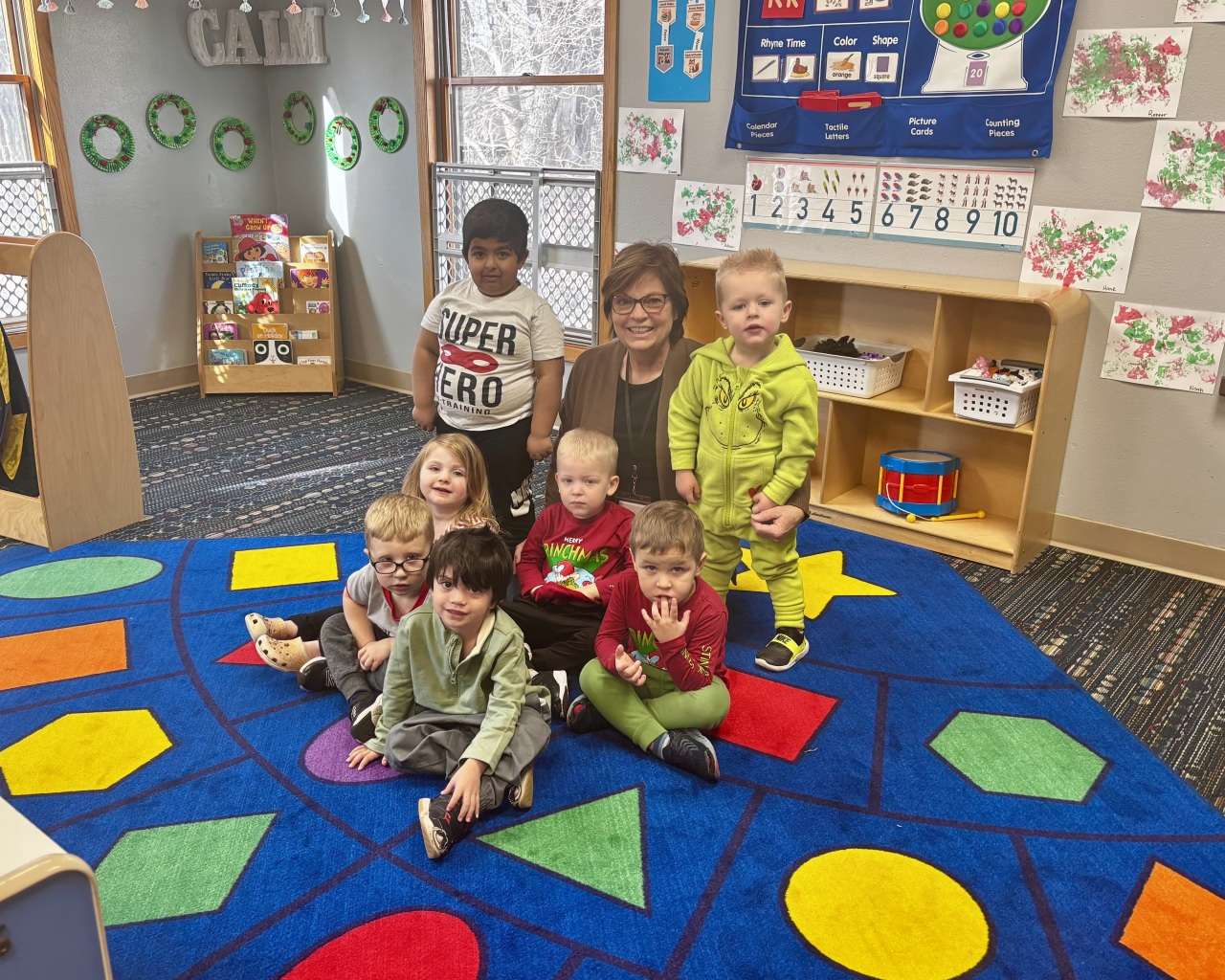 Karen Thomason of Hays Area Children's Center with her students. Photo by Tony Guerrero/Hays Post