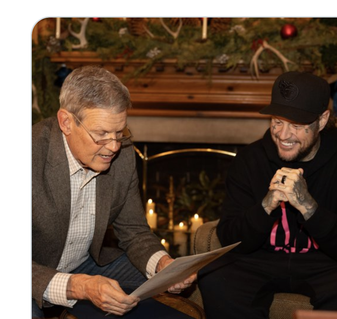 Photo provided by the office of Tennessee Gov. Bill Lee shows Gov. Bill Lee, left, giving country musician Jelly Roll news of his official pardon&nbsp;