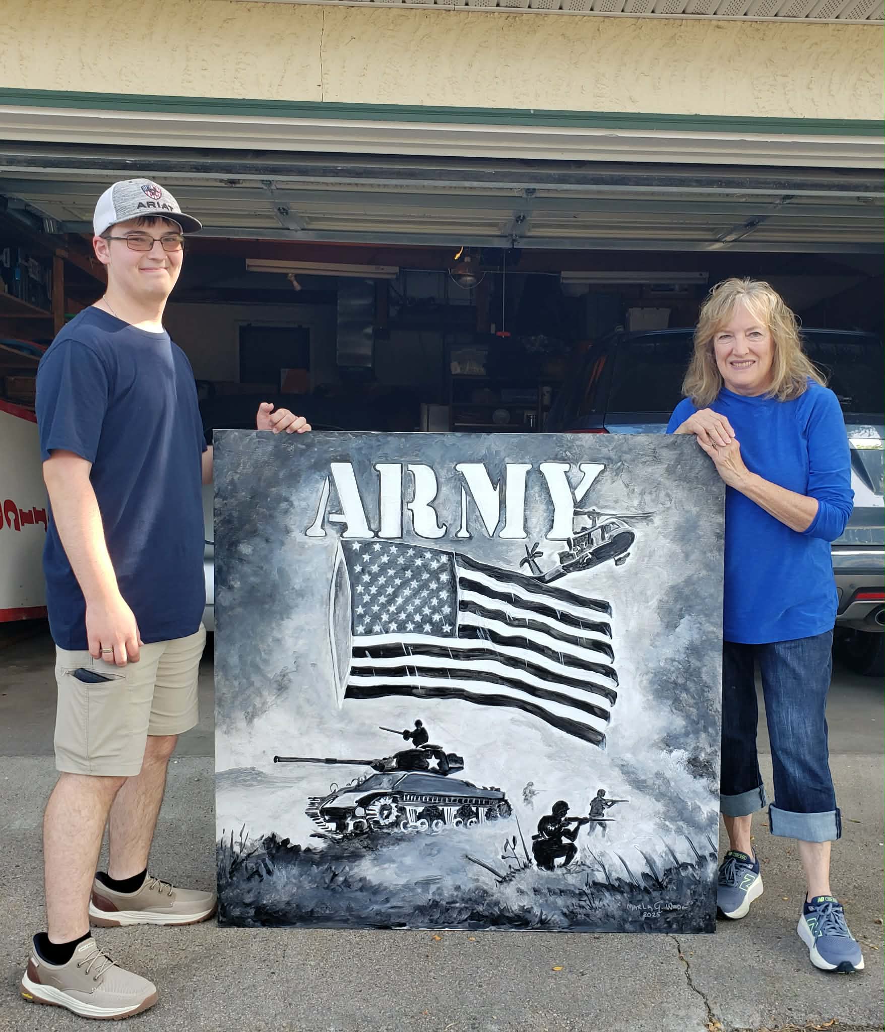 Troop 216 scout Dracen Buschow stands with the artists who depicted branches of the military in paintings for his Eagle Scout project.