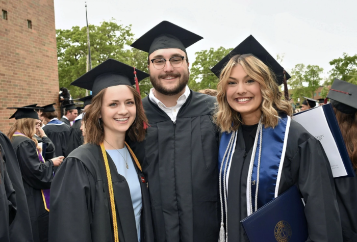 From left: Maddi Cave, her fiance, AJ Britten, and her best friend, Amber Hussain, celebrate their graduation from Drake University in Des Moines, Iowa. For the past year, recent college graduates have faced a job market flooded with more applicants and fewer jobs. Provided
