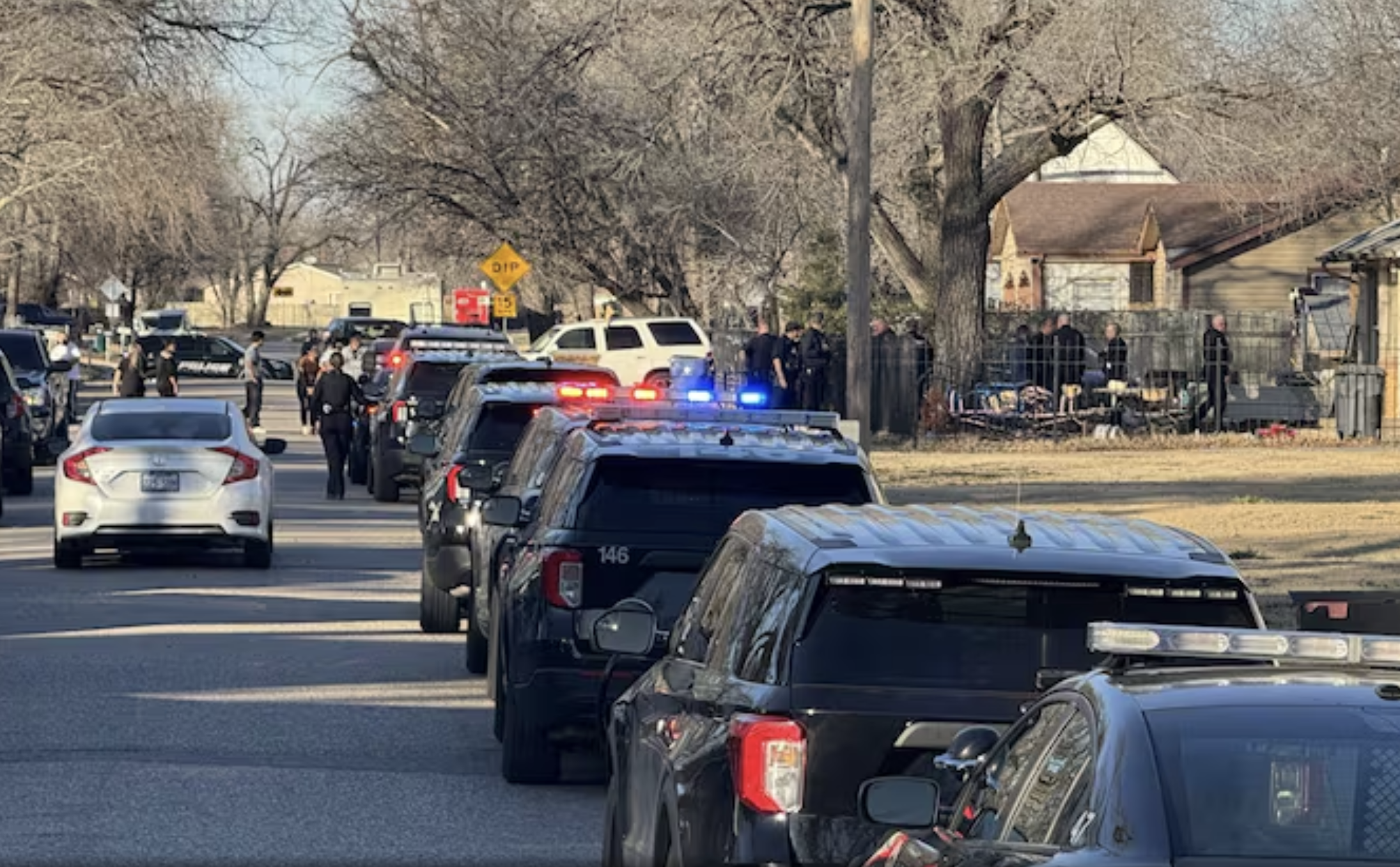 Police at the scene on Monday- photo courtesy KWCH