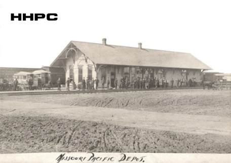 Missouri-Pacific Depot - First One At - S.W. Cor. Ave. G &amp; Main - c. 1888  (by Glines) (Burned Down 1895). Courtesy of the Conard-Harmon Collection.