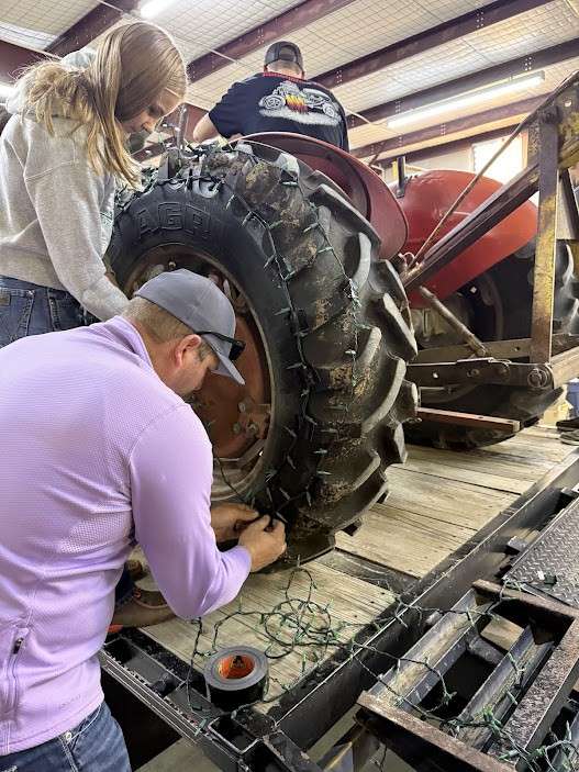 Preparing for the frost fest parade was a team effort with most of the membership and parents of members helping to get the float ready. Courtesy photo