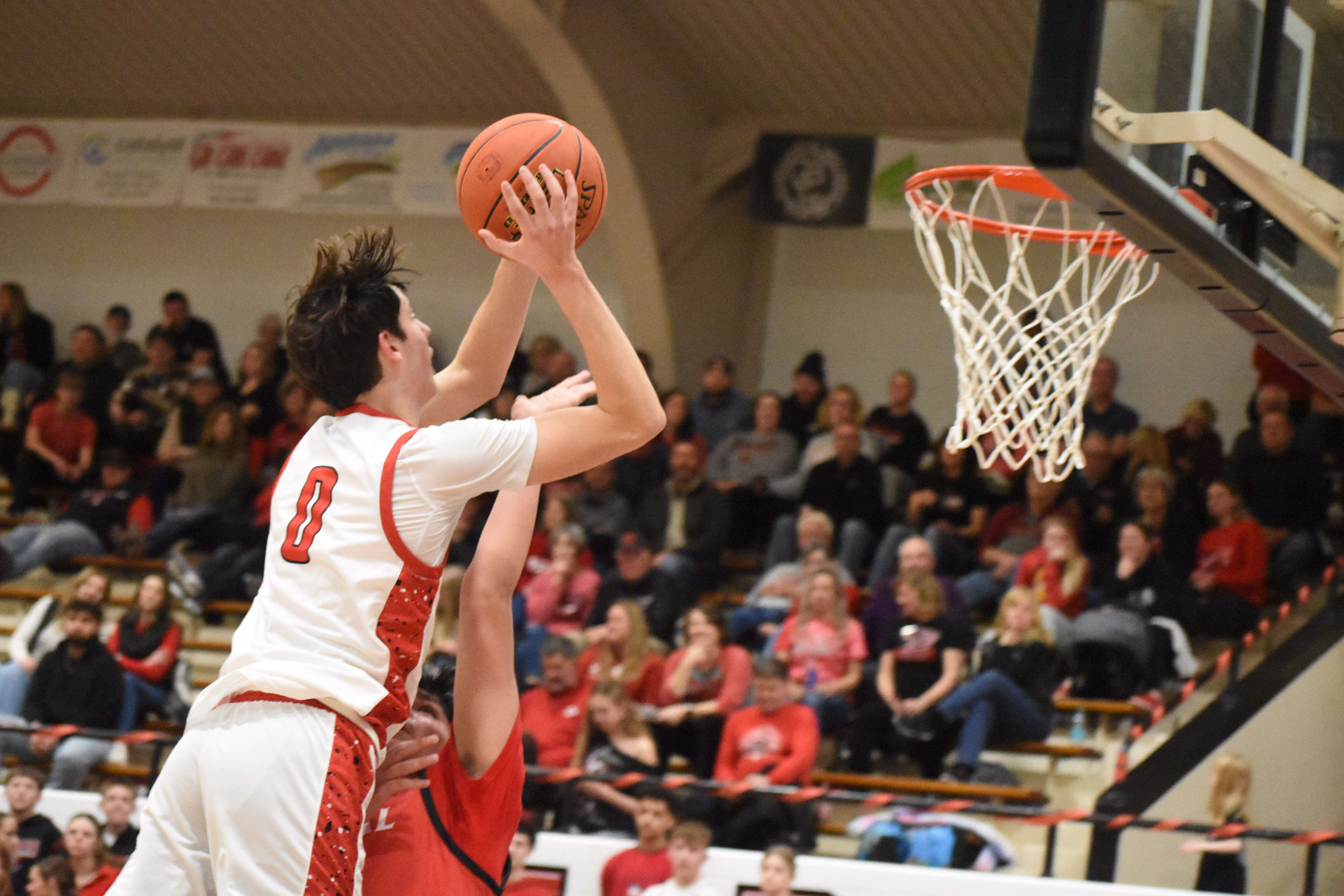 Panther senior Ben Nicholson put up 19 points and 10 rebounds in Friday's 78-41 Homecoming win against Liberal.