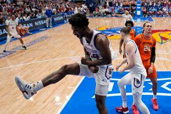 &nbsp;Kansas forward KJ Adams Jr. (24) celebrates after dunking the ball during the first half of an NCAA college basketball game against Oklahoma State Saturday, Feb. 22, 2025, in Lawrence, Kan. (AP Photo/Charlie Riedel)