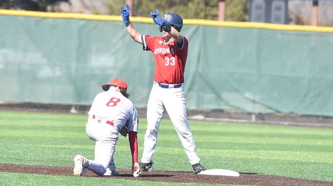 Anthony Mazza reacts after hitting an RBI double in Game 2 of a doubleheader against Coffeyville on Thursday at Hobart-Detter Field. (Sammi Carpenter/Blue Dragon Sports Information)