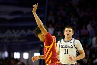 &nbsp;Iowa State guard Curtis Jones (5) celebrates a 3-point basket against Kansas State as Kansas State guard Brendan Hausen (11) looks on during the first half of an NCAA college basketball game in Manhattan, Kan., Saturday, March 8, 2025. (AP Photo/Reed Hoffmann)
