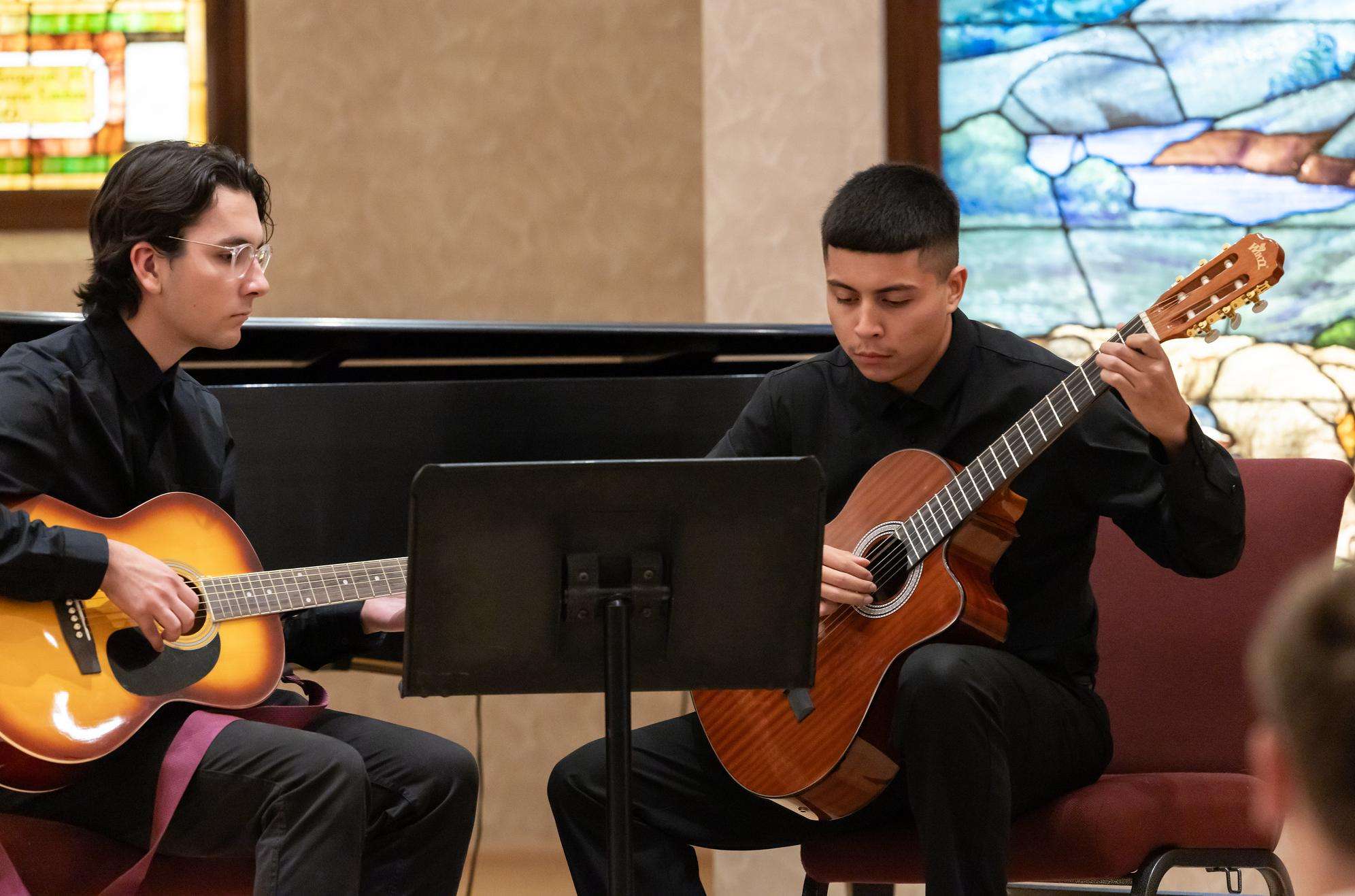 Students perform at a recital in the fall. 