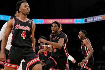 &nbsp;Houston's Ja'Vier Francis (5) celebrates with teammates after Houston beat Duke in the national semifinals at the Final Four of the NCAA college basketball tournament, Saturday, April 5, 2025, in San Antonio. (AP Photo/Eric Gay)