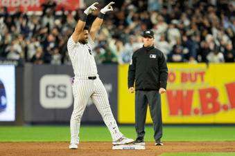 &nbsp;New York Yankees' Jasson Domínguez reacts after hitting a three-run double during the sixth inning of a baseball game Kansas City Royals Tuesday, April 15, 2025, in New York. All the players are wearing 42 in honor of Jackie Robinson Day. (AP Photo/Seth Wenig)