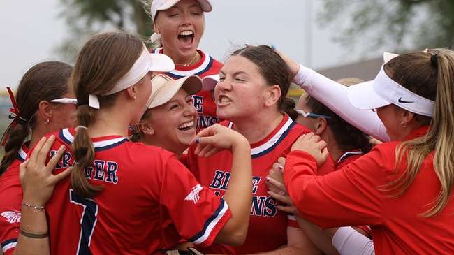 Blue Dragon players celebrate after the final out of a come-from-behind 7-5 victory over Barton in Game 2 on Sunday in Great Bend to clinch the 2025 Jayhawk Conference Championship. (Billy Watson/Blue Dragon Sports Information)