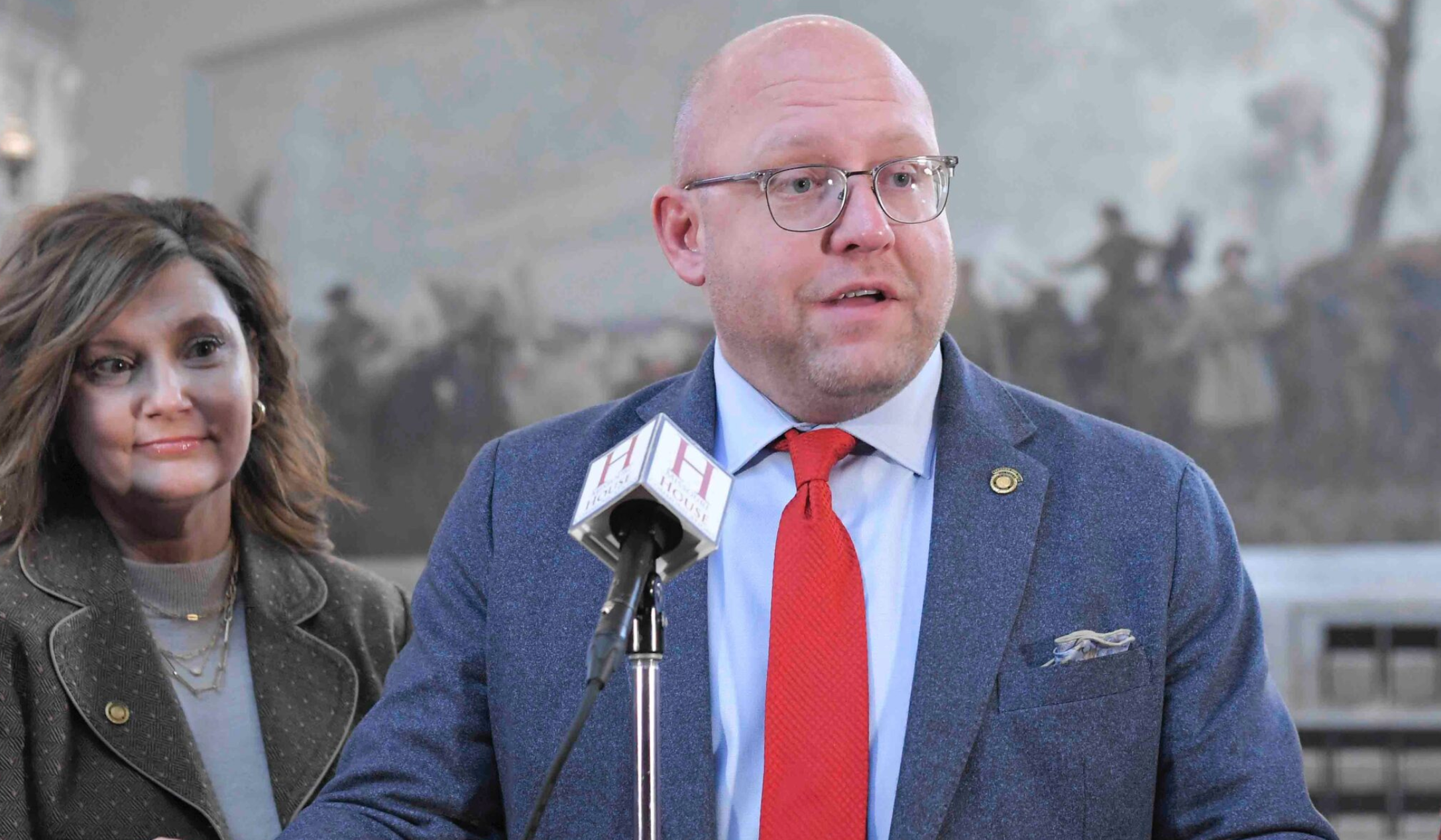 Missouri House Speaker Pro Tem Chad Perkins of Bowing Green speaks at a news conference Feb. 13 with state Rep. Melissa Schmidt, a Republican from Eldridge (Tim Bommel/Missouri House Communications).