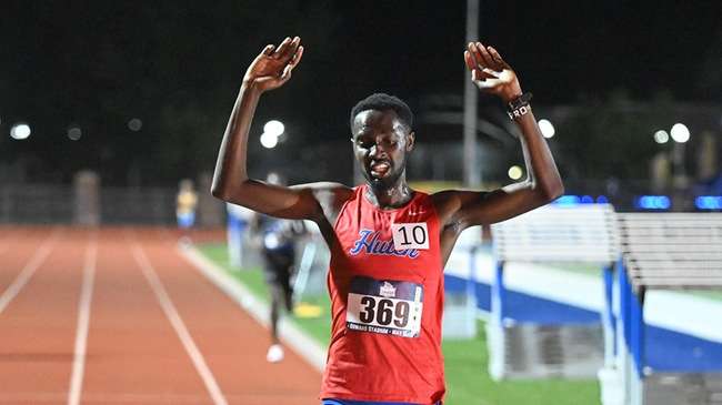 Blue Dragon sophomore Titus Kiprotich breaks his own 10,000-meter school record in a fourth-place performance on Thursday at the NJCAA Division I Track and Field Championships at Gowans Stadium. (Andrew Carpenter/Digital Fox Photography)
