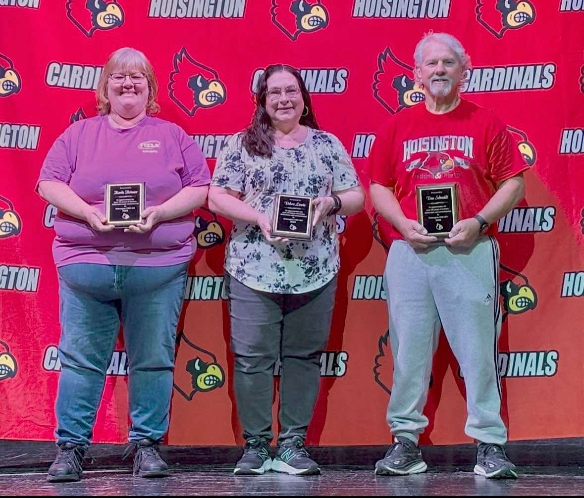 Hoisington High School teachers with over three decades of service (from left to right): Karla Reisner 31 years, Debra Lewis 33 and Dan Schmidt 32)