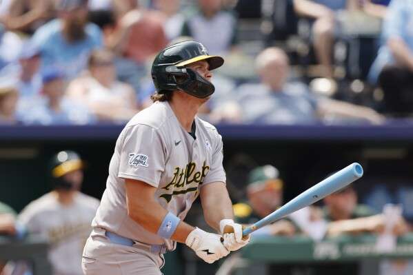 Athletics' Nick Kurtz watches his go-ahead home run during the ninth inning of a baseball game against the Kansas City Royals in Kansas City, Mo., Sunday, June 15, 2025. (AP Photo/Colin E. Braley)