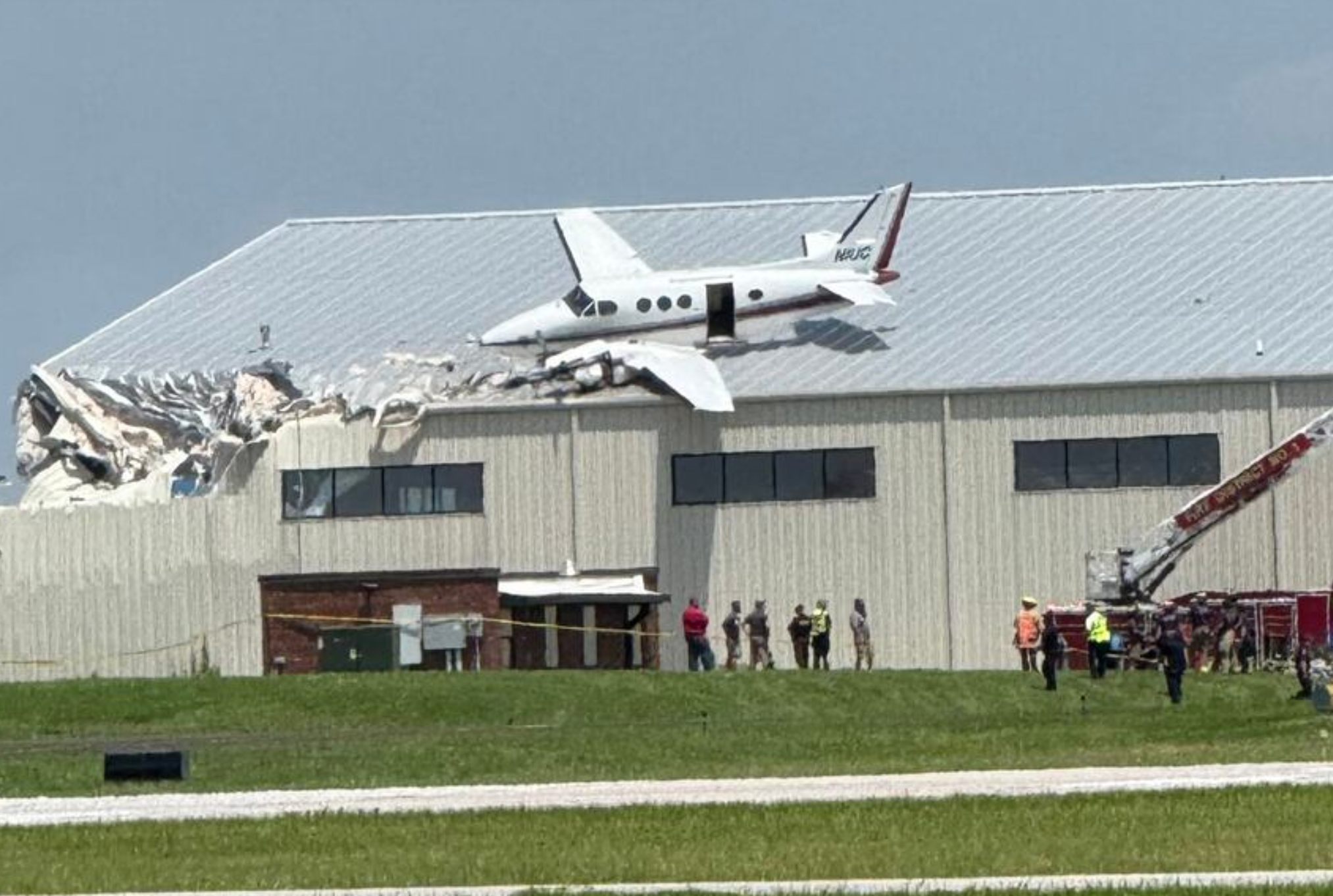 2 hospitalized after plane crash into building at Kansas airport