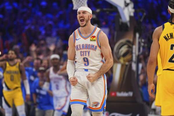 Oklahoma City Thunder guard Alex Caruso (9) celebrates during the second half of Game 5 of the NBA Finals basketball series against the Indiana Pacers, Monday, June 16, 2025, in Oklahoma City. (AP Photo/Kyle Phillips)