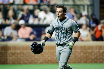  FILE - Coastal Carolina's Caden Bodine (17) celebrates hitting a solo home run during an NCAA super regional college baseball game against Auburn, Friday, June 6, 2025 in Auburn, Ala. (AP Photo/Stew Milne, File)